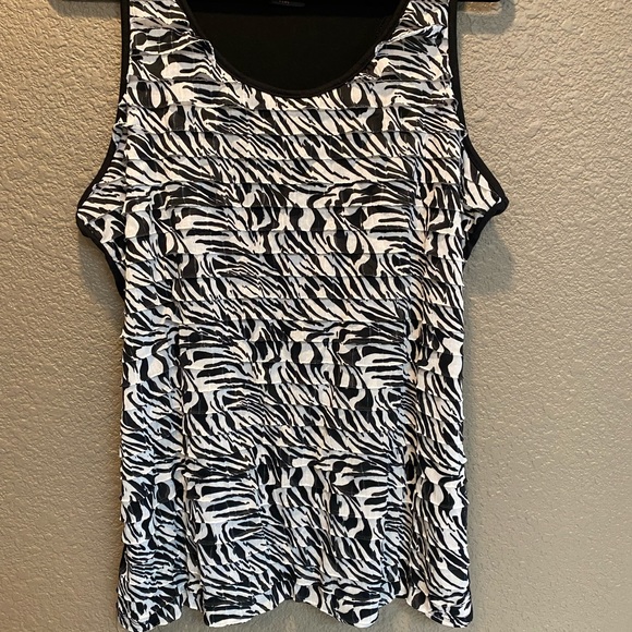 Black and white tank top with ruffle front and all black back. Like new. - Picture 1 of 3